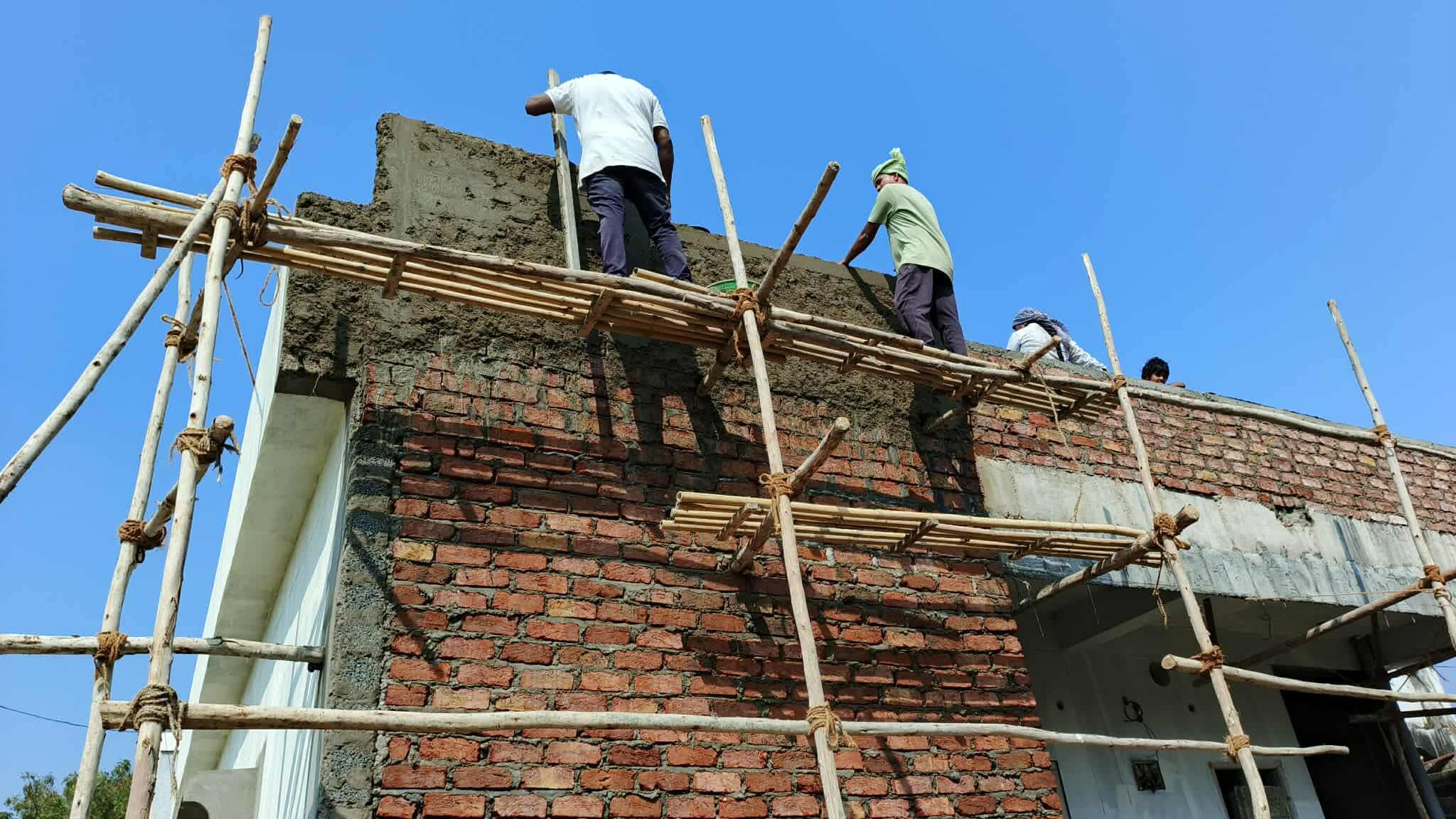 Volunteers working on the roof